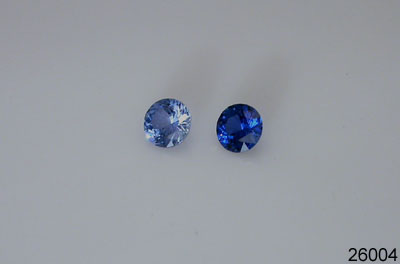 A pair of 5 mm Round Double Brillant Light Blue Created Sapphire 